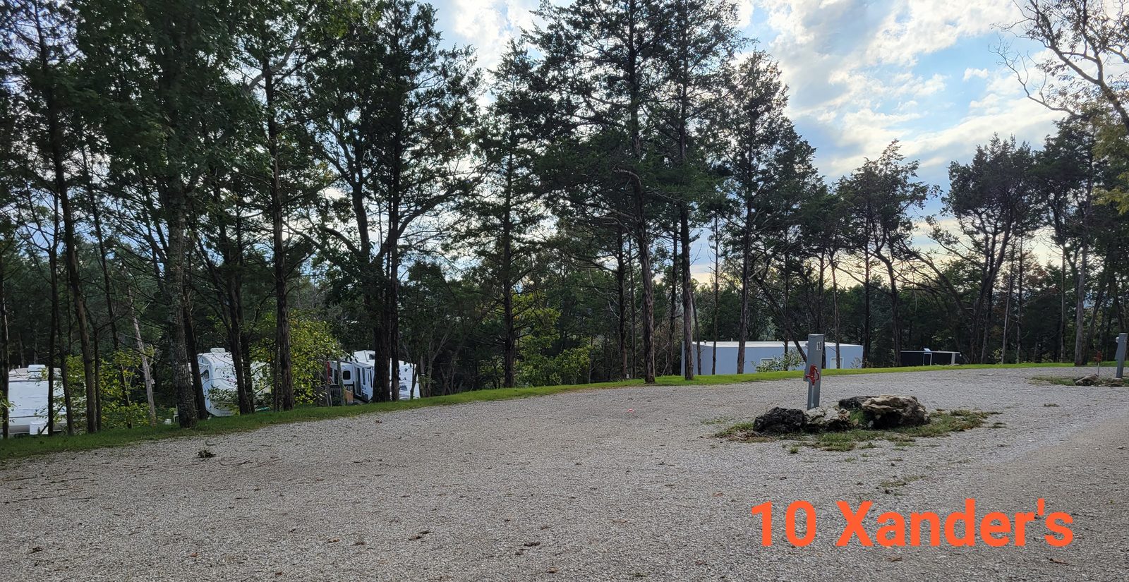 Open site 10 on Xander's Way with a distant Table Rock Lake view.