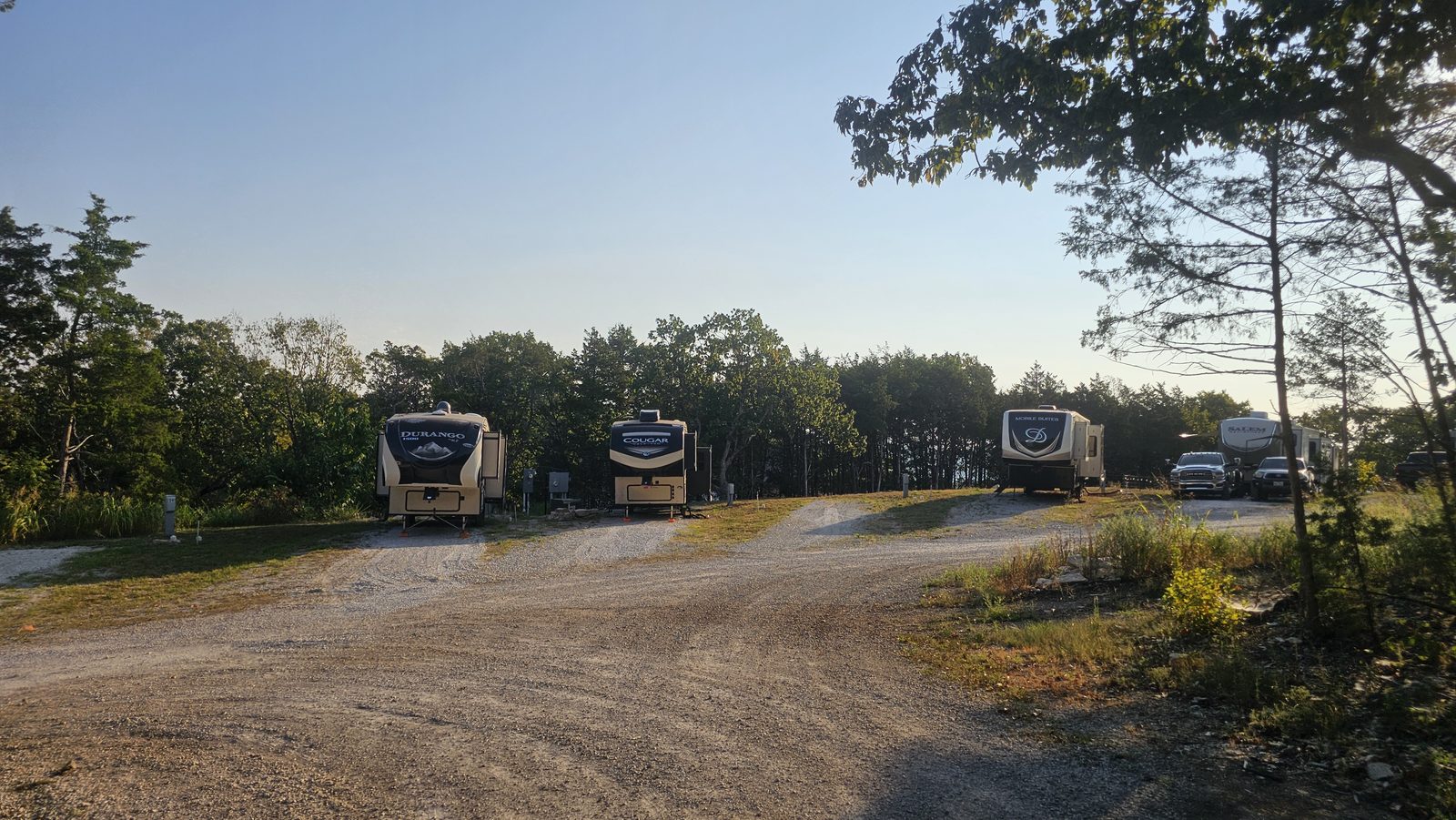Wide morning view across the Area71 sites near the shoreline.
